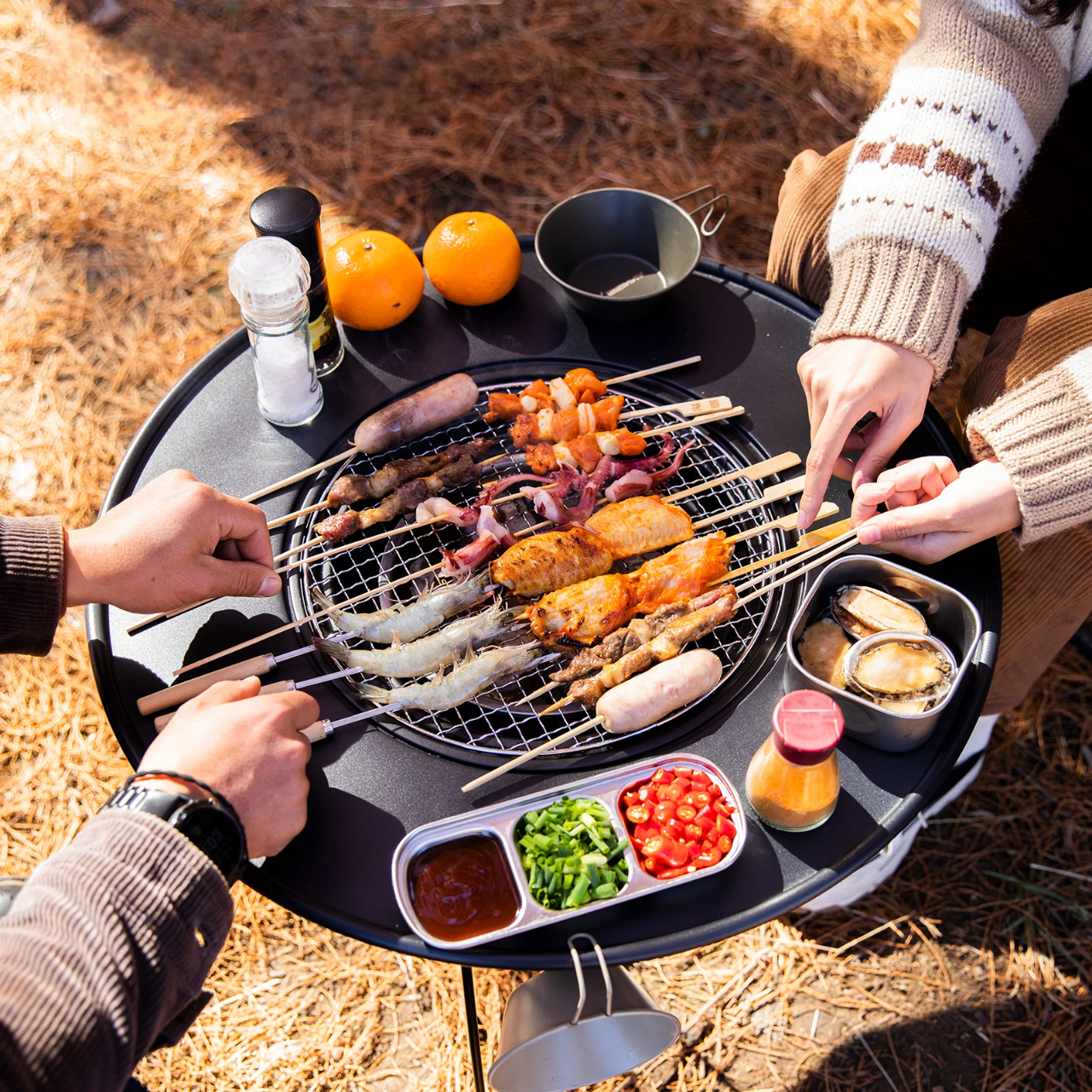 Table ronde pliante avec barbecue intégrée portable en métal