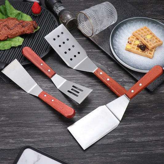 Spatule en acier inoxydable avec manche en bois rouge